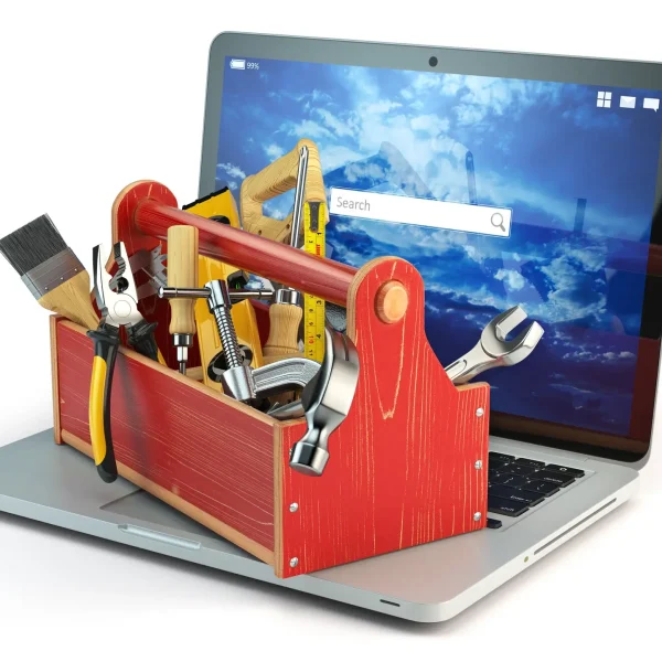 Online support. Laptop and toolbox with tool isolated on white Online support. Laptop and toolbox with tool isolated on white