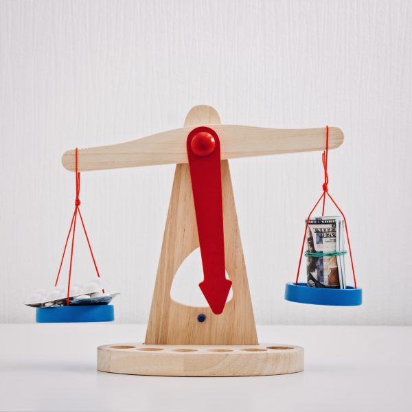 Treatment or savings. Cost of health, Compare of healthcare price and healthy life. Many pills pack